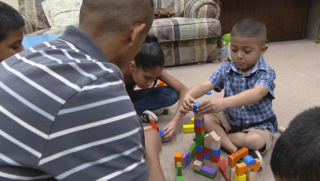 Jesus Berrones is living inside the Shadow Rock United Church of Christ in Phoenix while fighting deportation. His 5-year-old son, Jayden, is battling leukemia. (CBS News)